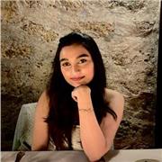 Patient, supportive student tutor helping others build confidence.